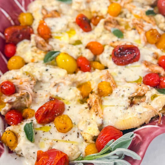 Stuffed Shells with Smoked Chicken &amp; Gouda - Pasta shells filled with smoked chicken and Gouda, baked in a sage brown butter Alfredo sauce with blistered cherry tomatoes