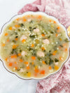 Italian Wedding Soup - Classic chicken broth with tender meatballs, pasta, carrots, celery, spinach, and parmesan