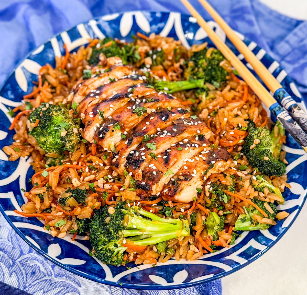 Garlic Miso Chicken with Soy Butter Veggie Rice Bowl - Grilled chicken glazed in garlic miso, served with umami-rich soy butter rice, broccoli, and carrots