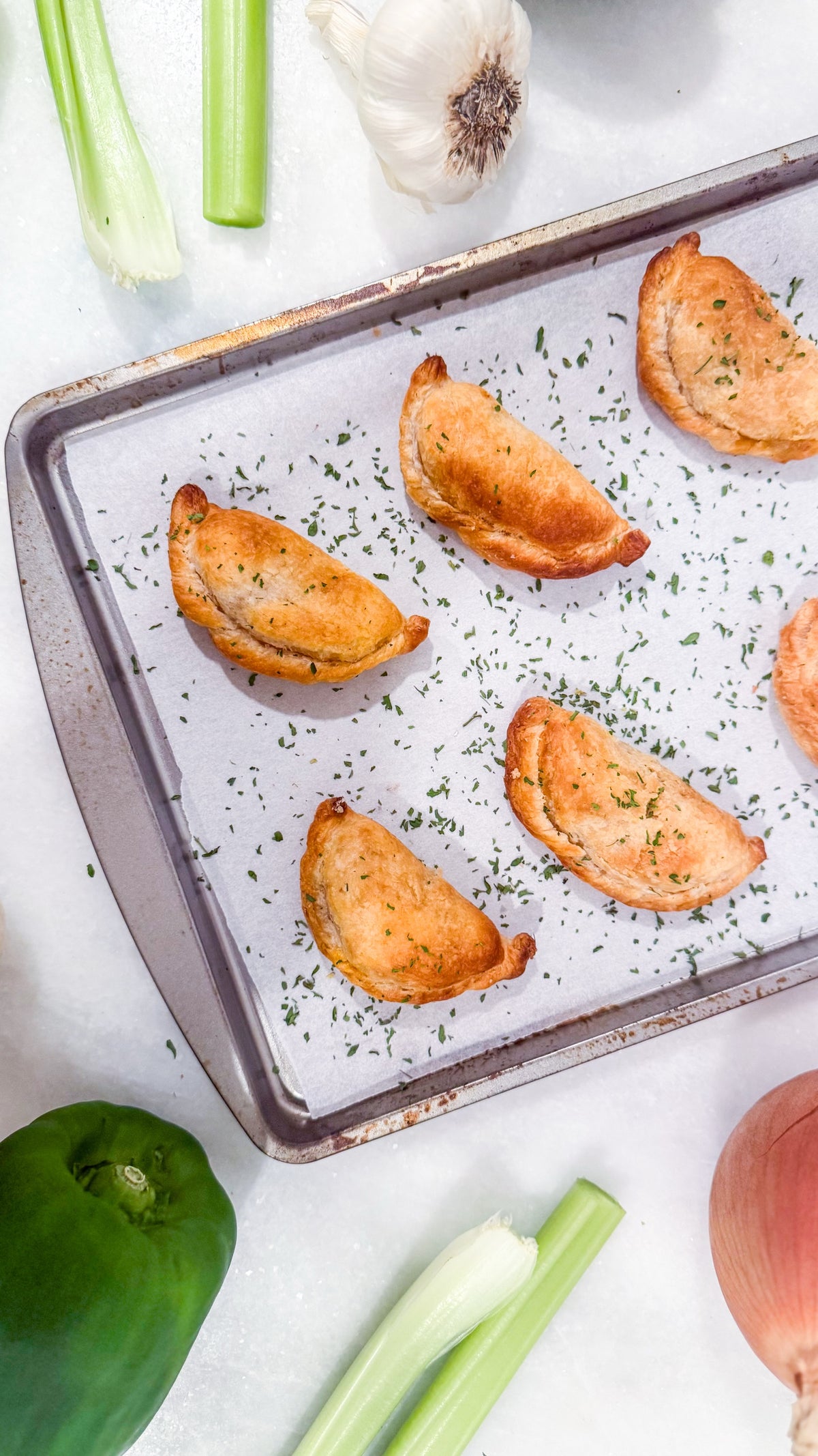 Southwest Chicken &amp; Queso Hand Pies - Flaky, golden pastry filled with southwest seasoned chicken, white queso and lime crema for dipping sauce