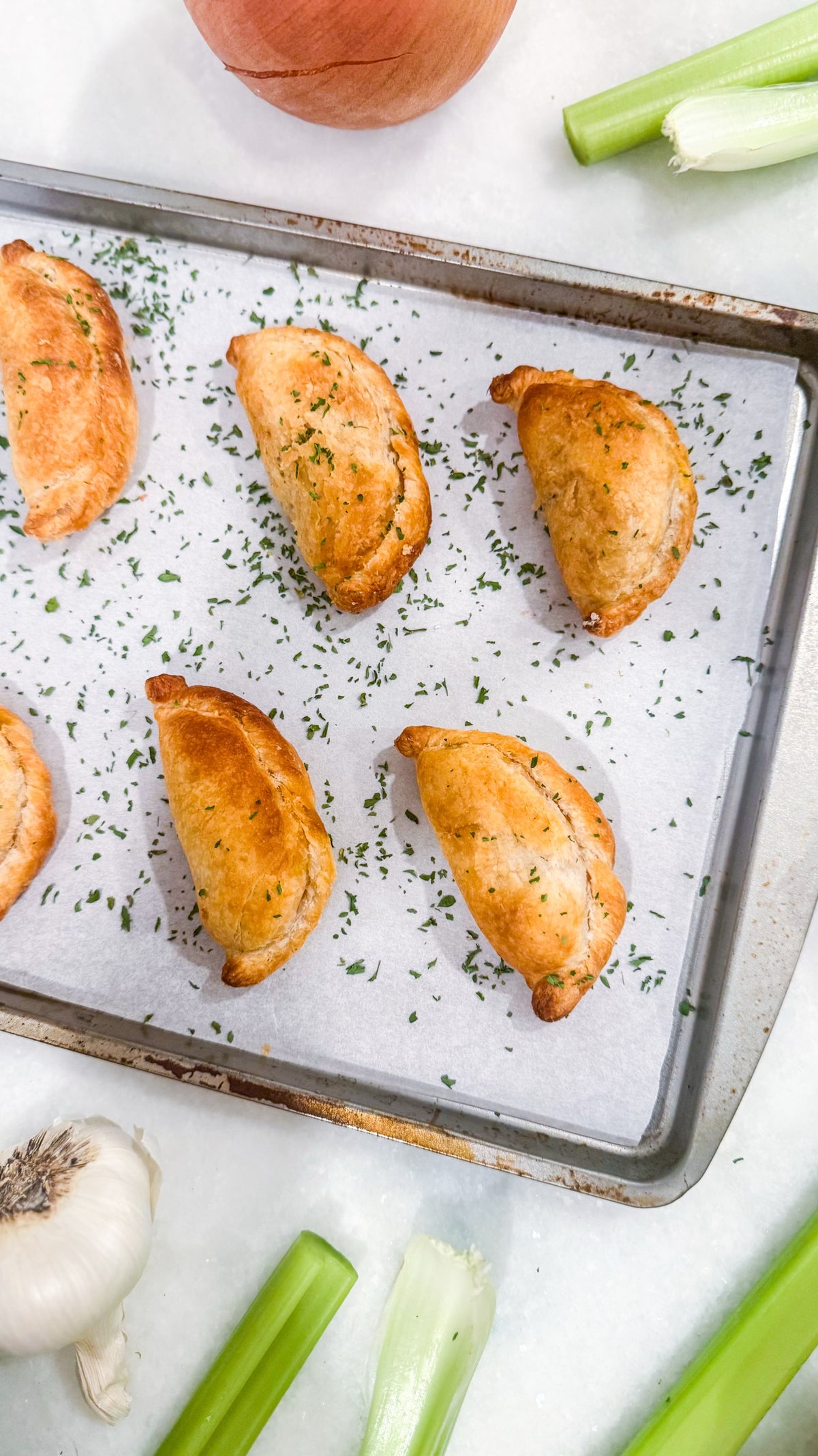 Southwest Chicken &amp; Queso Hand Pies - Flaky, golden pastry filled with southwest seasoned chicken, white queso and lime crema for dipping sauce