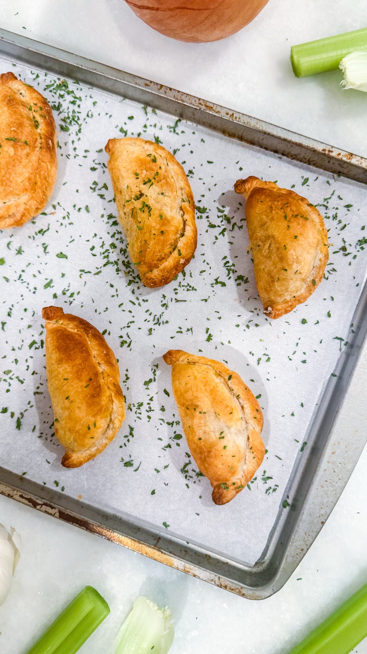 Southwest Chicken &amp; Queso Hand Pies - Flaky, golden pastry filled with southwest seasoned chicken, white queso and lime crema for dipping sauce