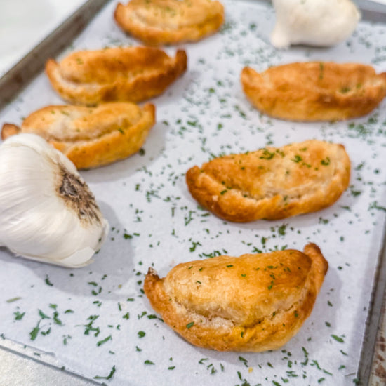 Southwest Chicken &amp; Queso Hand Pies - Flaky, golden pastry filled with southwest seasoned chicken, white queso and lime crema for dipping sauce