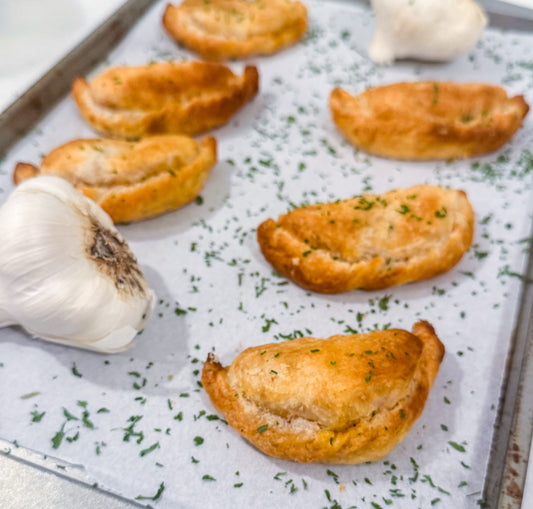 Southwest Chicken &amp; Queso Hand Pies - Flaky, golden pastry filled with southwest seasoned chicken, white queso and lime crema for dipping sauce
