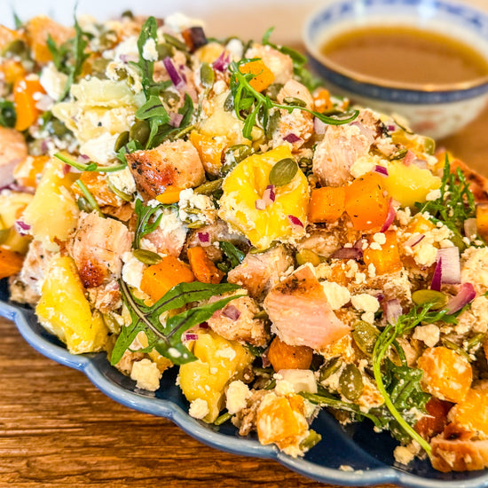 Roasted Squash Pasta Salad - Roasted squash, pepitas, and goat cheese combined with grilled chicken, shallots, baby arugula, and tender tortellini, all tossed in a rich brown butter vinaigrette.