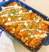 Chicken &amp; Butternut Squash Enchilada Bake - Tender chicken, roasted butternut squash, Mexican cheese and golden enchilada sauce wrapped in tortillas and topped with crumbly cotija cheese and herb crema