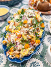 Roasted Squash Pasta Salad - Roasted squash, pepitas, and goat cheese combined with grilled chicken, shallots, baby arugula, and tender tortellini, all tossed in a rich brown butter vinaigrette.