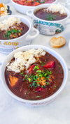 Frozen Chicken and Sausage Gumbo - Creole chicken, smoked sausage, onion, bell pepper, celery, garlic, roux, chicken stock, Creole seasoning, bay leaf, green onions