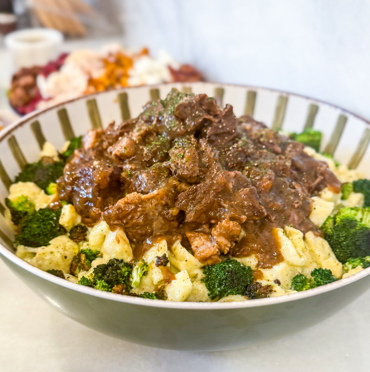 Slow-Braised Beef Pot Roast - Pot roast with broccoli mac ‘n’ cheese made with Unexpected Cheddar