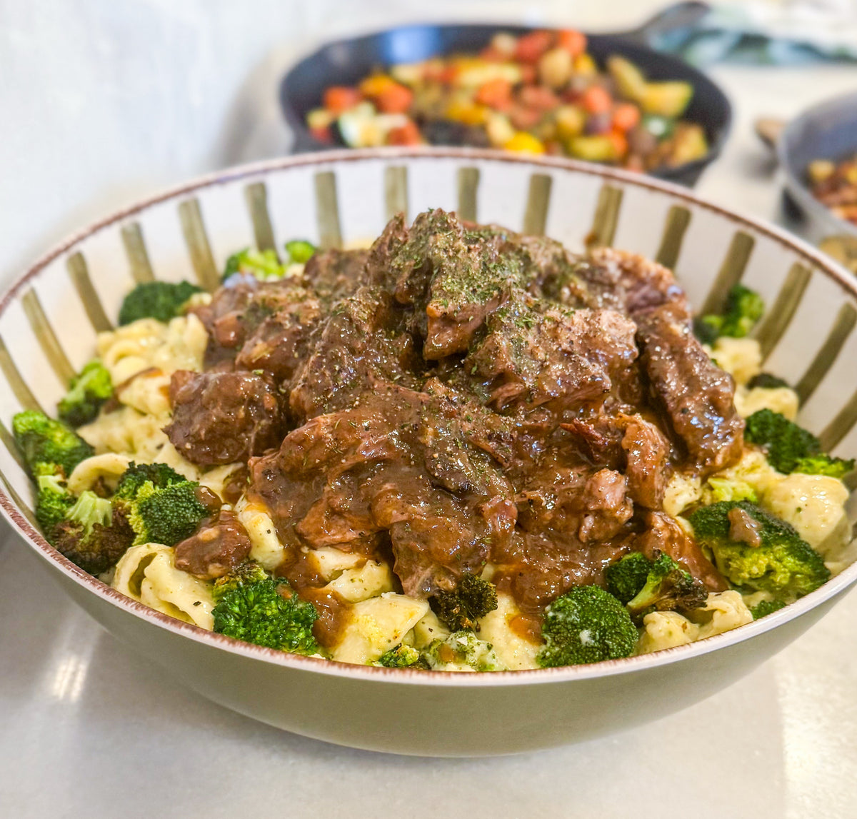 Slow-Braised Beef Pot Roast - Pot roast with broccoli mac ‘n’ cheese made with Unexpected Cheddar