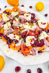 Eat Fit Seasonal Fruit &amp; Burrata Bowl - Cherries and citrus with burrata, prosciutto, pomegranate, pistachios, thyme, fresh herbs, honey, and grilled Eat Fit approved bread
