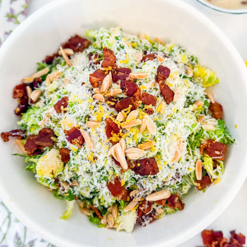 Eat Fit Brussels Sprout Salad - Shaved Brussels Sprouts with Bacon, Toasted Almonds, Parmesan, and Creamy Lemon-Bacon Vinaigrette