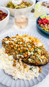 Twice Baked Eggplant: Roasted Eggplant Stuffed with Lemon Hummus, Whipped Feta and Crispy Chickpeas with Grilled Bread