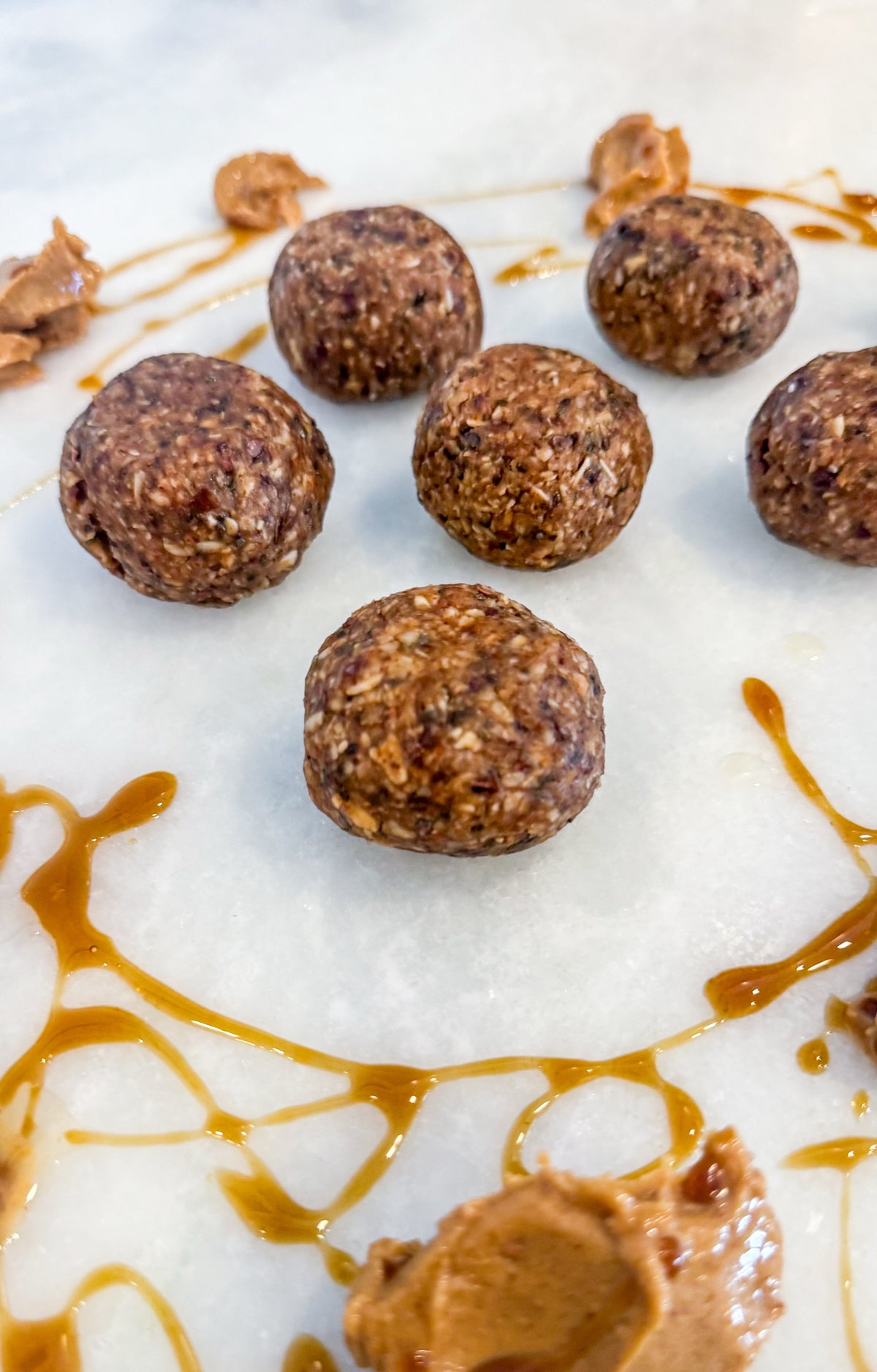 Protein Energy Balls - Rolled oats, almond butter, dates, chia seeds, salted honey, cacao nibs