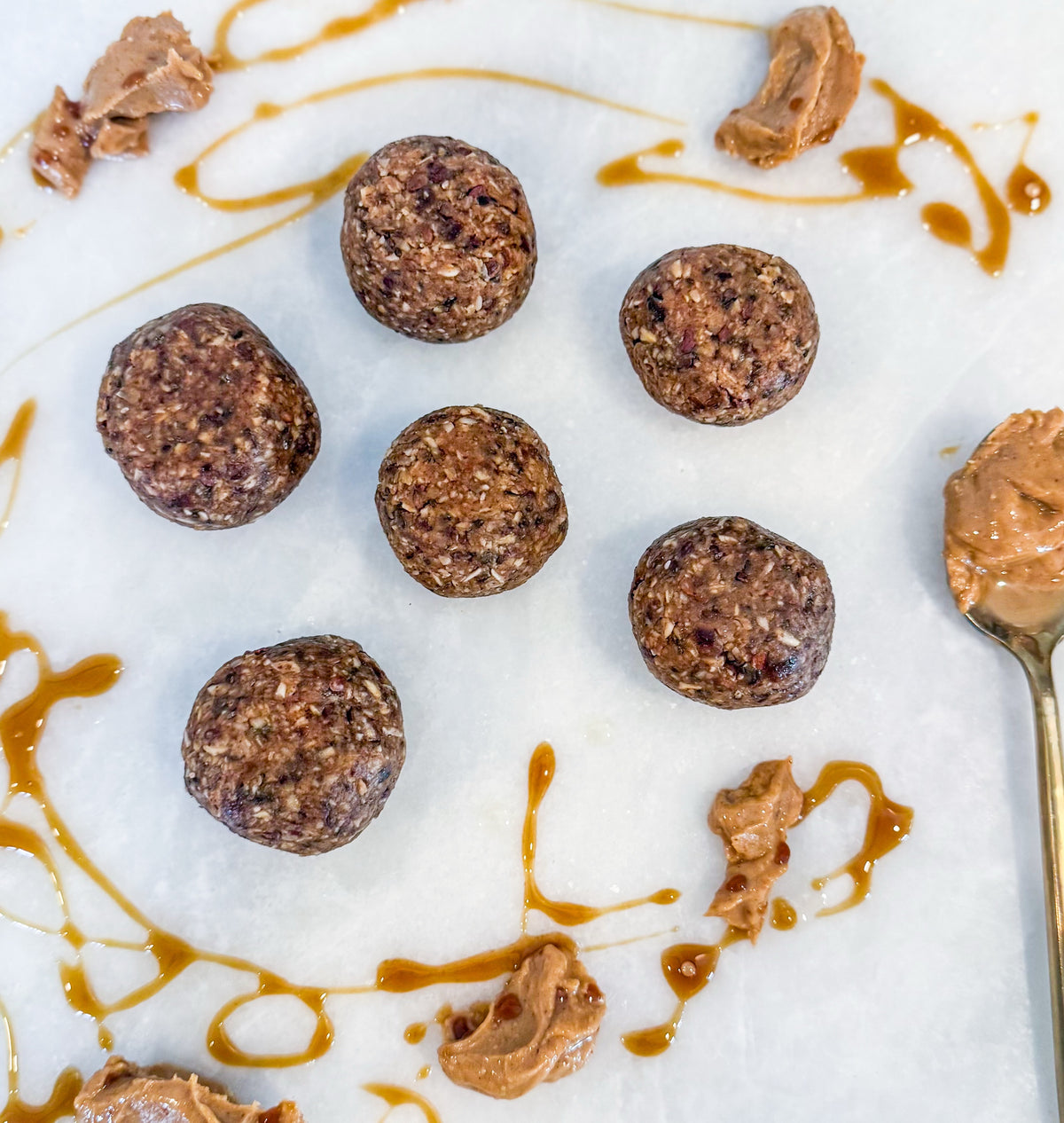 Protein Energy Balls - Rolled oats, almond butter, dates, chia seeds, salted honey, cacao nibs