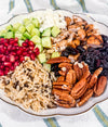 Autumn Wild Rice Bowl - Fig-butter grilled chicken, wild rice, dried cherries, pomegranate seeds, cucumbers, toasted pecans, goat cheese, blood-orange balsamic glaze