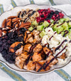 Autumn Wild Rice Bowl - Fig-butter grilled chicken, wild rice, dried cherries, pomegranate seeds, cucumbers, toasted pecans, goat cheese, blood-orange balsamic glaze
