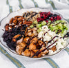 Autumn Wild Rice Bowl - Fig-butter grilled chicken, wild rice, dried cherries, pomegranate seeds, cucumbers, toasted pecans, goat cheese, blood-orange balsamic glaze